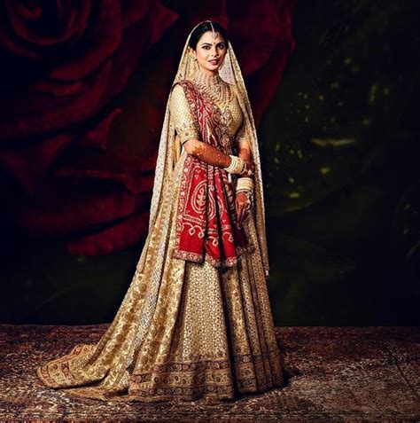 isha ambani wedding gown.